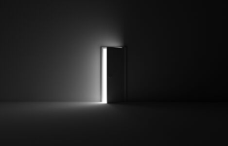 A,Grayscale,Shot,Of,An,Open,Door,Letting,Light,Into