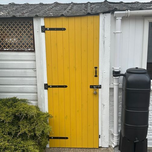Customer image of Mendes Unfinished Redwood Ledged &amp; Braced Shed Door