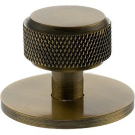 Millhouse Brass Eiffel Knurled Round Cabinet Knob Handle on Backplate